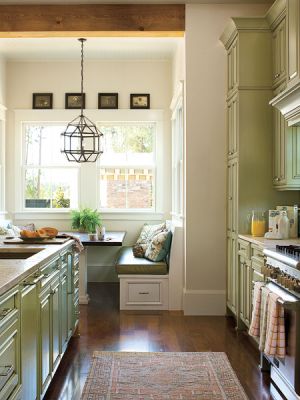 Luscious kitchen with banquette green tones.jpg